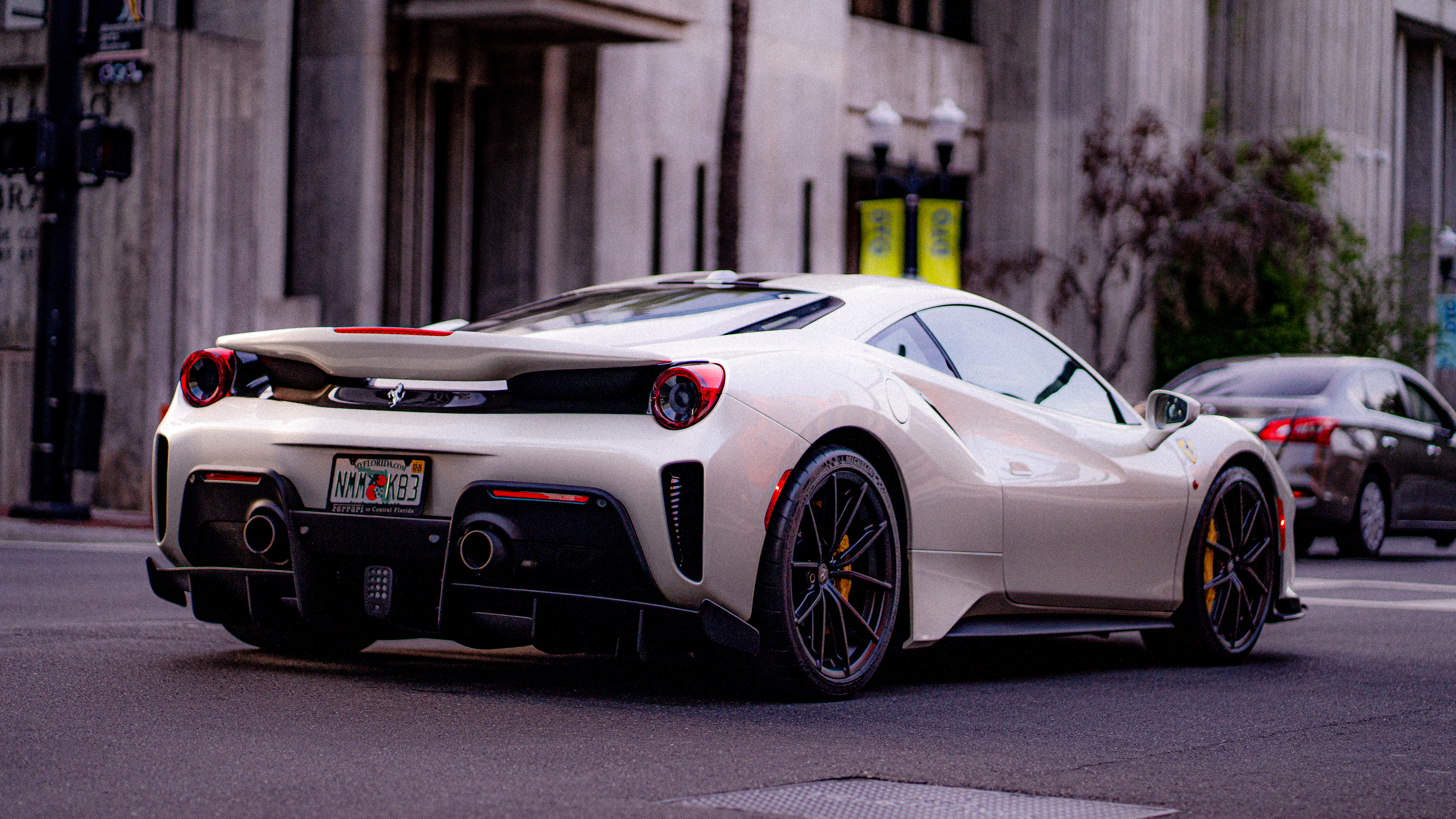 White supercar rear view — automotive photography